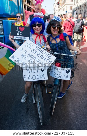 ROME  JUNE 7: Rome Gay Pride Parade on June 7, 2014 in Rome, Italy. Two lesbians show in bicycle