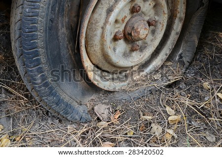 Detail Shot of a Flat Tire on a Old Car Selection Focus on Tire