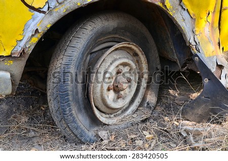 Detail Shot of a Flat Tire on a Old Car Selection Focus on Tire