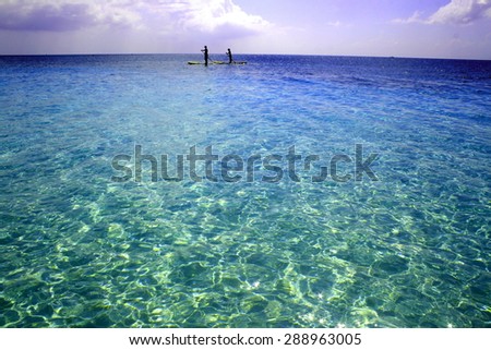 Paddle Boarding along Grand Cayman\'s 7 Mile Beach
