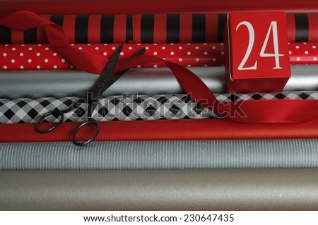 Wrapping Gifts for Christmas Wrapping Paper and Scissor Stock Photo