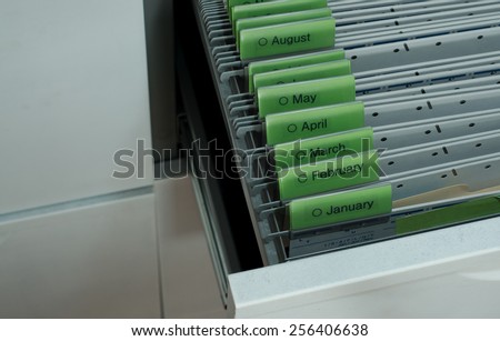 Documents Organized by Month - Hanging Files in File Cabinet Drawer