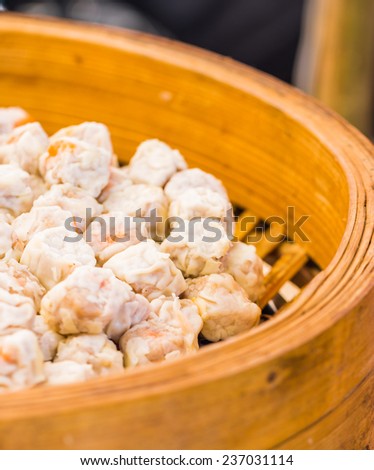 The chinese steamed dumpling.Chinese snacks ; rice or wheat dough enclosing minced meat and steamed