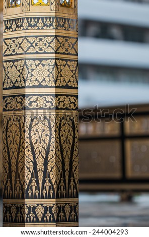 Thai art on pillar.(Gold apply on black lacquer)