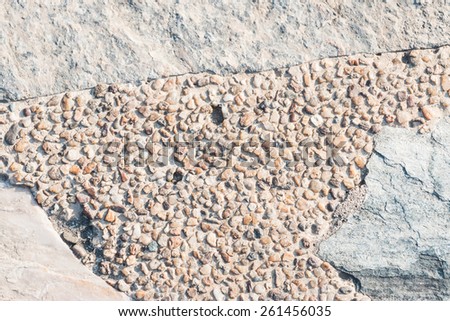 Stone in Sand wash Floor Background.