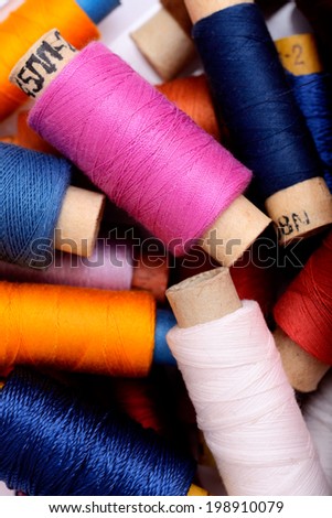 Background with multi color thread spools