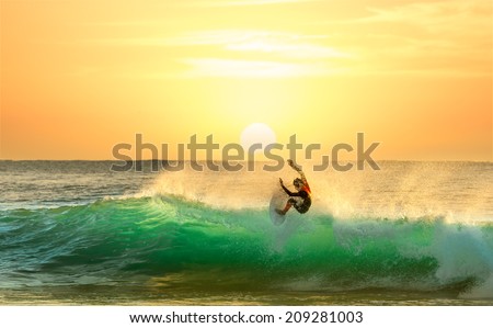 Surfing at Sunrise Surfing at Sunrise