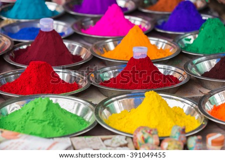 Bowls of vibrant colored dyes in India - holi colors.
