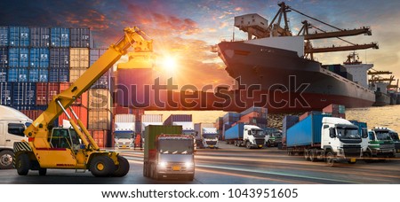 Logistics and transportation of Container Cargo ship and Cargo plane with working crane bridge in shipyard at sunrise, Shipping cargo to harbor Aerial view from drone, International transportation