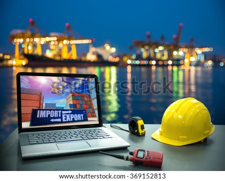 Business concept, industry. Laptop desk on with Industrial Container Cargo freight ship for Logistic Import Export background