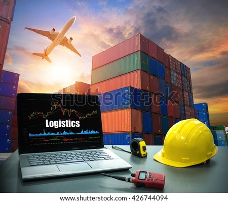 Business concept, industry Laptop desk on with Containers shipping, container box loading for logistic Import Export concept