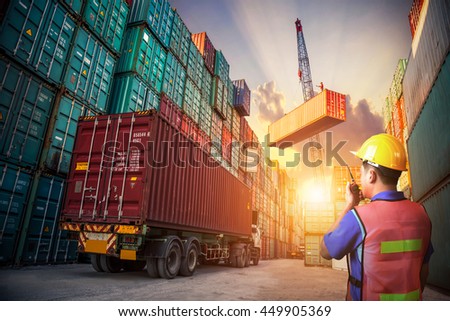 Business logistic concept, Foreman control loading Containers box to truck for Logistic Import Export Background