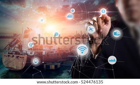 Businessman is pressing button on touch screen interface in front for Logistic Import Export background, Internet of Things concept