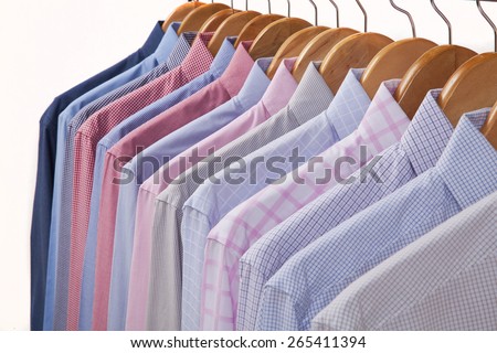 Cloth Hangers with Shirts in several colors and textures