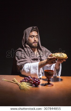 jesus christ consecrating the bread and wine