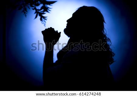 Jesus Christ praying at night on the Mount of Olives