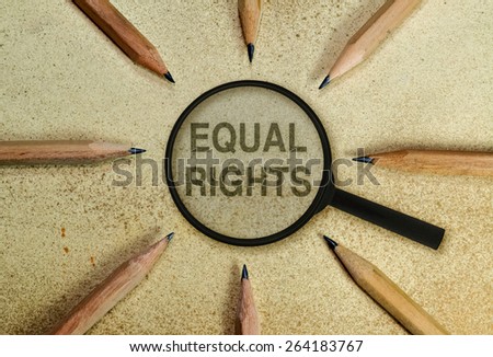Text under a magnifier in a conceptual image as appeal to respect human rights