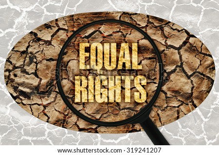 Text Equal Rights under a magnifier on abstract background