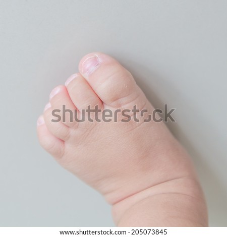 Foot of a little feet, isolated on a white background