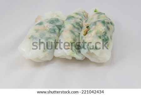 typical Vietnamese cuisine, popular dish in central area of Vietnamese, kind of rice cake with pork meatloaf and baby shrimp on white background.