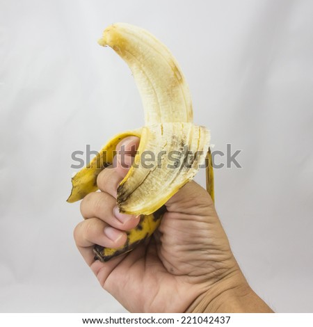old banana catch hand on white background