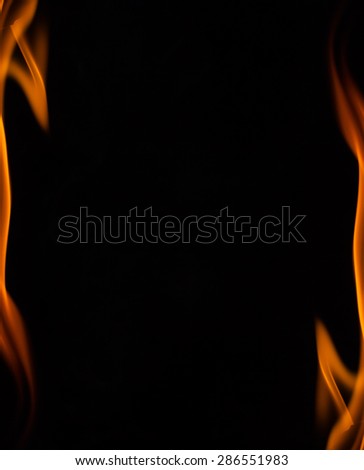 Fire stripe with free space for text, fire flames on black background,