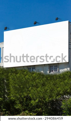 Blank billboard at daylight for advertisement, white billboard on sky background,