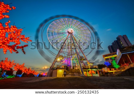 SHAH ALAM, MALAYSIA - JANUARY 31, 2015: Ferris wheel I-City theme parks at the night moment
