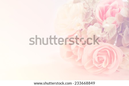 Bouquet of orange roses soft blur background in vintage pastel tones.