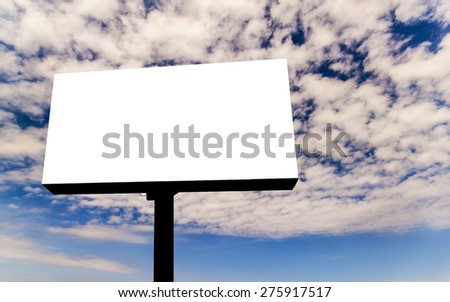 blank billboard with cloudy and blue sky background.