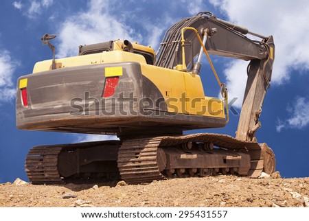 construction site digger, excavator and dumper truck. industrial machinery on building site
