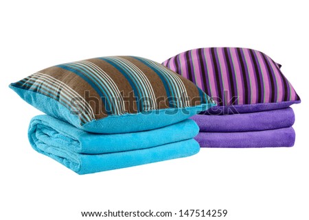 Bedding objects. Soft pillow on folded blanket.