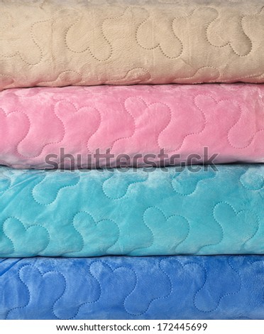 Close up of a folded duvets. For backgrounds.