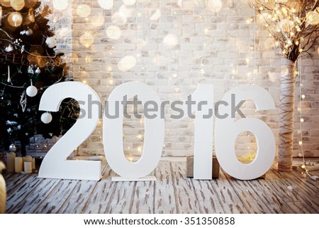 Christmas or New Year\'s interior. Big figures 2016. Holidays decor.