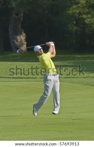 TORONTO, ONTARIO - JULY 21:English golfer Paul Casey hits to a green during a pro-am event at the RBC Canadian Open golf on July 21, 2010 in Toronto, Ontario.