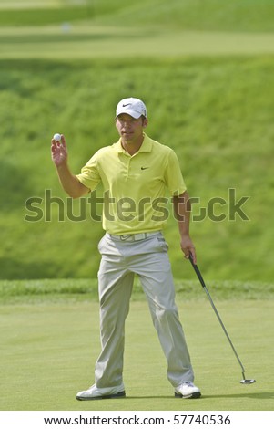 TORONTO, ONTARIO - JULY 21:English golfer Paul Casey acknowledges applause after putting during a pro-am event at the RBC Canadian Open golf on July 21, 2010 on Toronto, Ontario.