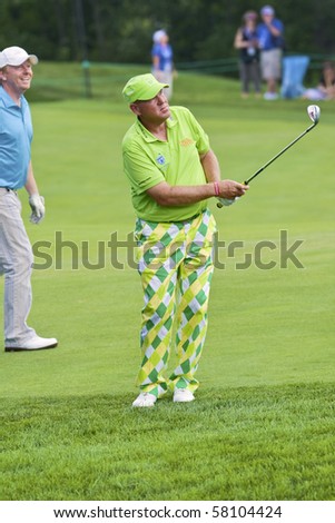 TORONTO, ONTARIO - JULY 21: US golfer John Daly during a pro-am event at the RBC Canadian Open golf, St. George\'s; Golf and Country Club July 21, 2010 in Toronto, Ontario
