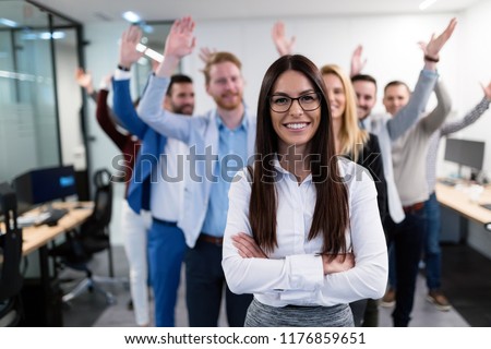 Group picture of business team posing in office