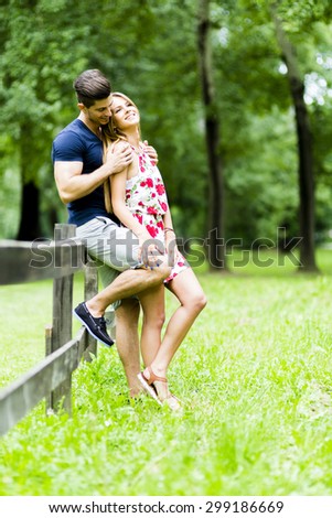 Happy couple loving each other outdoors and being happy