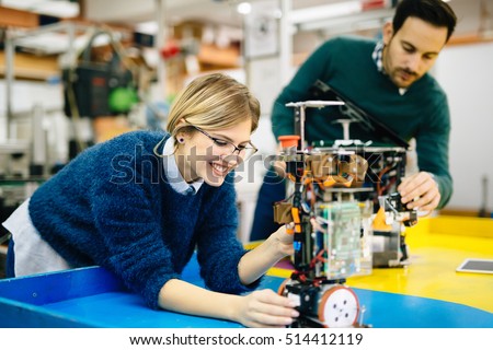 Engineering and robotics student working on project