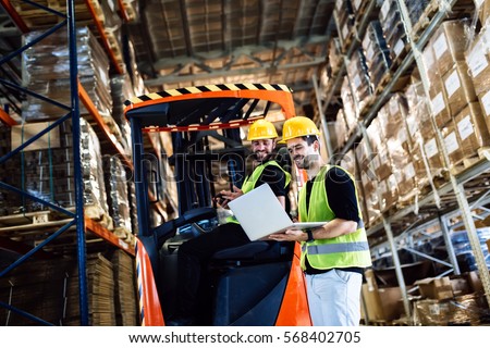 Warehouse logistics work being done with forklift