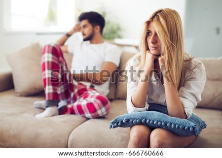 Unhappy couple having crisis and difficulties in relationship