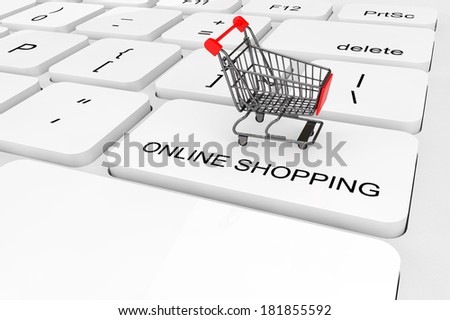 Online Shopping concept. Extreme closeup Shopping Cart on a keyboard