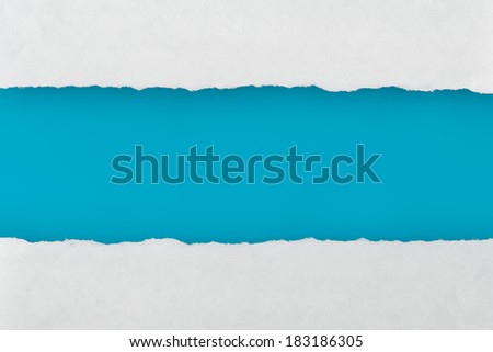 Closeup Torn Paper with blue blank space for your text