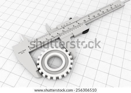 Metal Vernier Caliper over Graph Paper on a white background