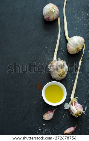 Garlic and olive oil on slate plate