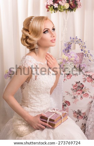 Beautiful and fashion bride in luxury interior. Beautiful and fashion bride with glamour makeup and hairstyle