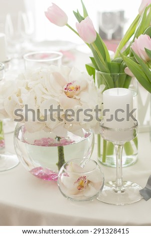 Wedding Table Decoration. Table set for a wedding dinner in white