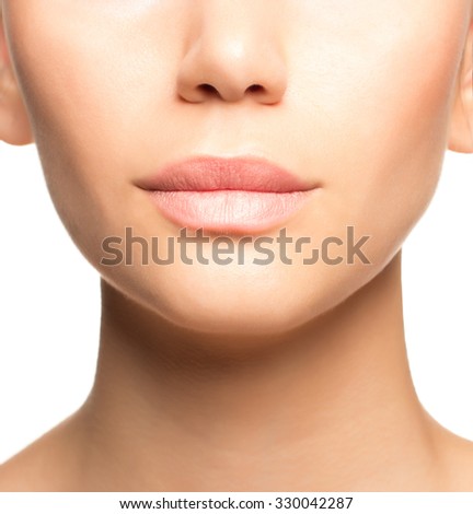 Beautiful Perfect Lips. Sexy Mouth close up. Beauty young woman Smile. Natural Plump full Lip. Lips augmentation. Close up over white background