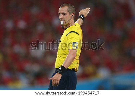 RIO DE JANEIRO, BRAZIL - June 18, 2014: Head referee Mark Geiger during the World Cup Group B game between Spain and Chile at Maracana Stadium. NO USE IN BRAZIL